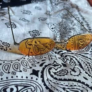 Orange tinted sunglasses